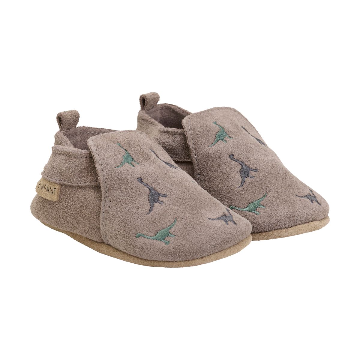 En Fant Semskede Tøfler Med Broderi Fungi